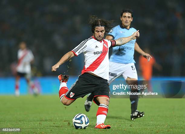 Fernando Cavenaghi of River Plate hits the ball during a match between Belgrano and River Plate as part of 12th round of Torneo Final 2014 at Mario...