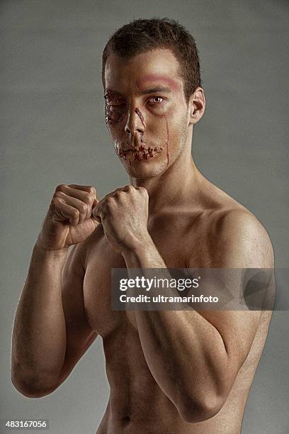 stage makeup beaten face  hdr portrait  young man   ultimate fighter - fighter portraits 2015 stock pictures, royalty-free photos & images