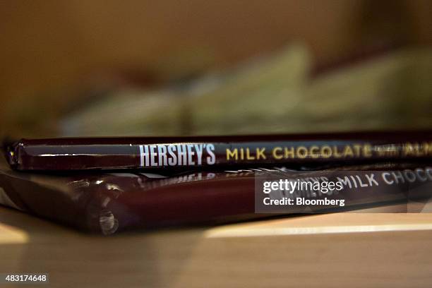 Hershey Co. Chocolate bars are arranged for a photograph in Tiskilwa, Illinois, U.S., on Tuesday, July 28, 2015. The Hershey Co. Is scheduled to...