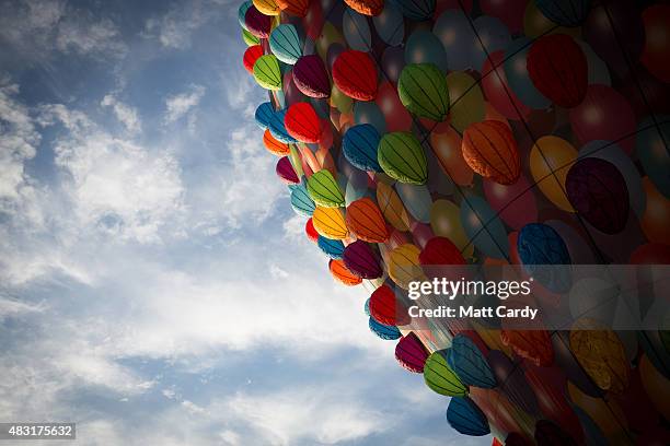 Balloons take to the skies on the first day of the Bristol International Balloon Fiesta at the Ashton Court estate on August 6, 2015 in Bristol,...