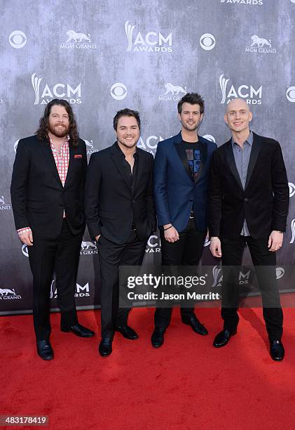 Musicians Mike Eli, James Young, Chris Thompson, Jon Jones of the Eli Young Band attend the 49th Annual Academy Of Country Music Awards at the MGM...