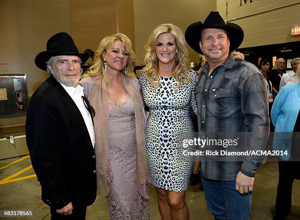 Recording artist Merle Haggard, Theresa Ann Lane, recording artist Trisha Yearwood and recording artist Garth Brooks attend the 49th Annual Academy...