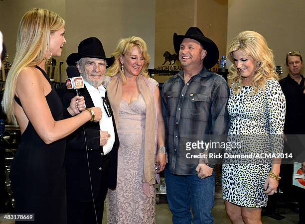 Recording artist Merle Haggard, Theresa Ann Lane, recording artist Garth Brooks and Trisha Yearwood attend the 49th Annual Academy of Country Music...