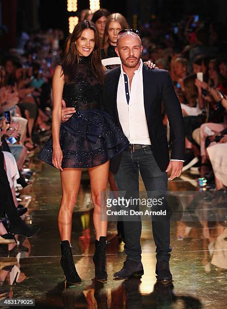 Alessandra Ambrosio poses alongside Alex Perry at the Alex Perry show during Mercedes-Benz Fashion Week Australia 2014 at Carriageworks on April 7,...