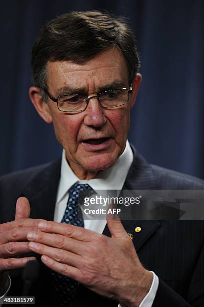 Angus Houston, head of the Joint Agency Coordination Centre leading the search for missing Malaysia Airlines flight MH370, speaks during a media...