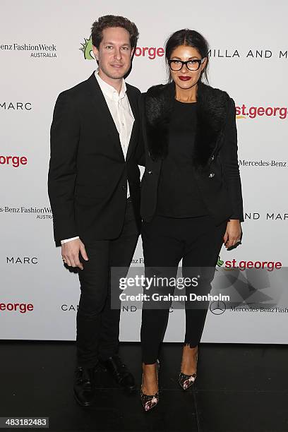 Designers Marc Freeman and Camilla Freeman-Topper of Camilla & Marc pose following an announcement that they are set to design St. George Bank...