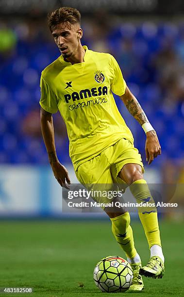 Samuel Castillejo of Villarreal runs with the ball during a Pre Season Friendly match between Levante UD and Villarreal CF at Ciutat de Valencia...