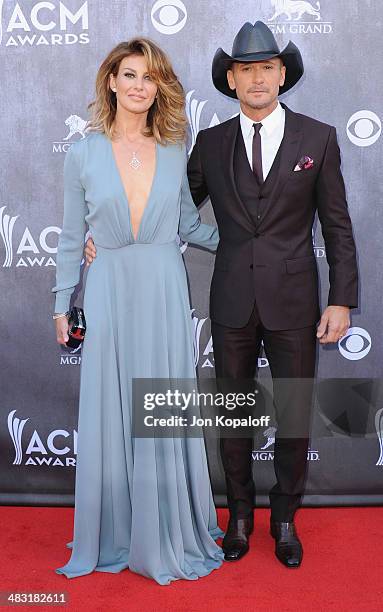 Singer Faith Hill and husband singer Tim McGraw arrive at the 49th Annual Academy Of Country Music Awards at the MGM Grand Hotel and Casino on April...