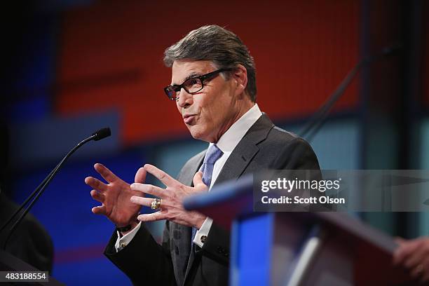 Rebulican presidential candidate Rick Perry fields a question during a presidential forum hosted by FOX News and Facebook at the Quicken Loans Arena...