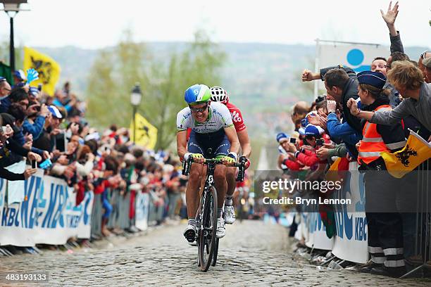 Daryl Impey of South Africa and Orica GreenEDGE rides up the Kwaremont during the 98th Tour of Flanders from Bruges to Oudenaarde on April 6, 2014 in...