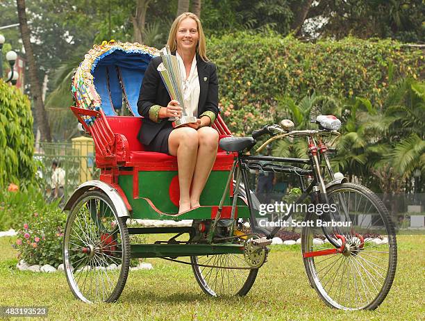 Meg Lanning, captain of Australia poses with the trophy on a rickshaw during a photocall after winning the Final of the ICC Women's World Twenty20...