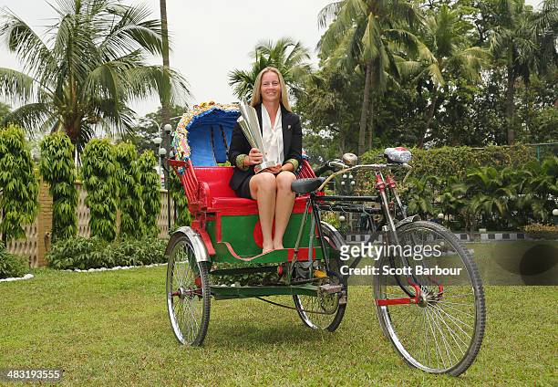Meg Lanning, captain of Australia poses with the trophy on a rickshaw during a photocall after winning the Final of the ICC Women's World Twenty20...