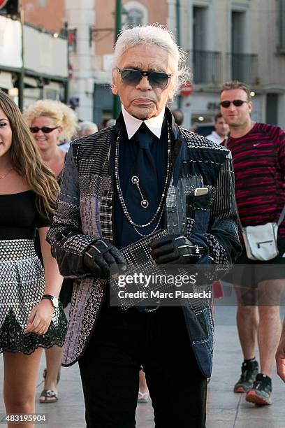 Karl Lagerfeld is seen on the harbour of Saint Tropez on August 6, 2015 in Saint-Tropez, France.