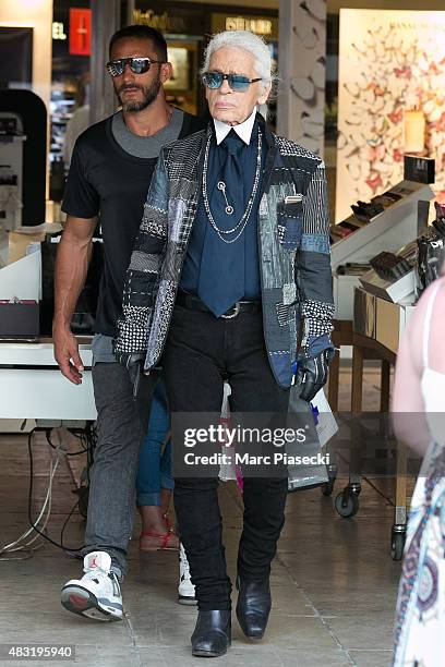 Karl Lagerfeld is seen on the harbour of Saint Tropez on August 6, 2015 in Saint-Tropez, France.