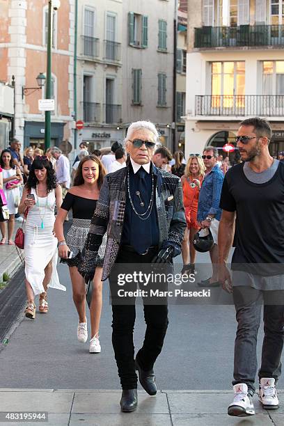 Karl Lagerfeld is seen on the harbour of Saint Tropez on August 6, 2015 in Saint-Tropez, France.