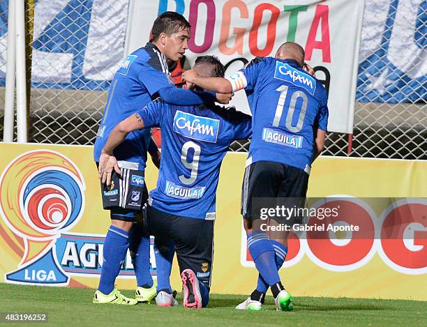 Michael Rangel of Millonarios celebrates with teammates after scoring the second goal of his team during a match between Patriotas FC and Millonarios...