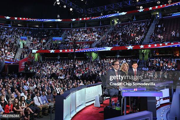 News anchors Chris Wallace, Megyn Kelly and Bret Baier prepare to moderate the first prime-time Republican presidential debate hosted at the Quicken...