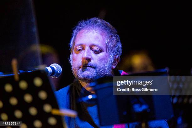 King Creosote performs along to the composite documentary film 'From Scotland with Love' on stage at at Kelvingrove Bandstand on August 6, 2015 in...