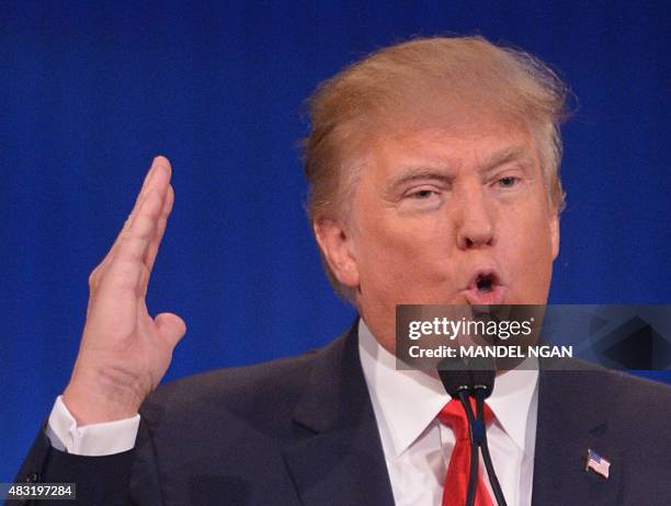 Real estate tycoon Donald Trump participates in the Republican presidential primary debate on August 6, 2015 at the Quicken Loans Arena in Cleveland,...