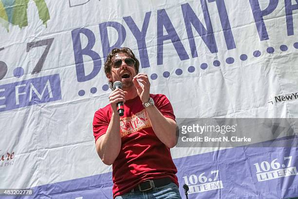 Actor/singer Christian Borle, from the broadway musical "Something Rotten", performs live on stage during 106.7 LITE FM's Broadway in Bryant Park...
