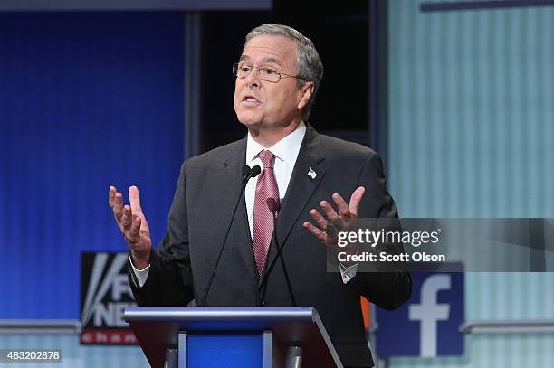 Republican presidential candidate Jeb Bush fields a question during the first Republican presidential debate hosted by Fox News and Facebook at the...