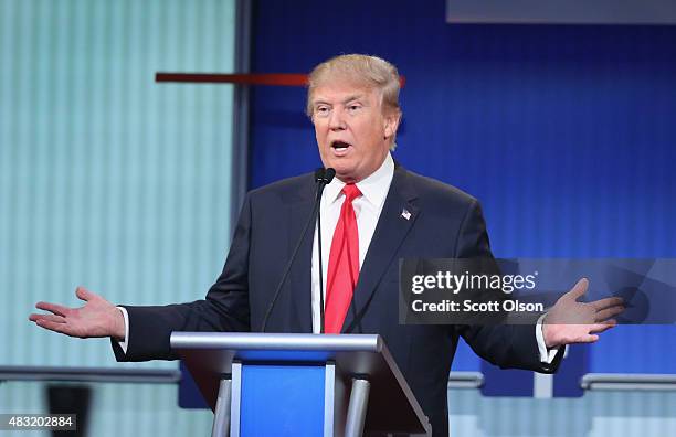 Republican presidential candidate Donald Trump fields a question during the first Republican presidential debate hosted by Fox News and Facebook at...