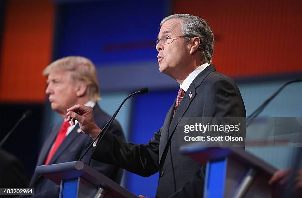 Republican presidential candidate Jeb Bush fields a question during the first Republican presidential debate hosted by Fox News and Facebook at the...