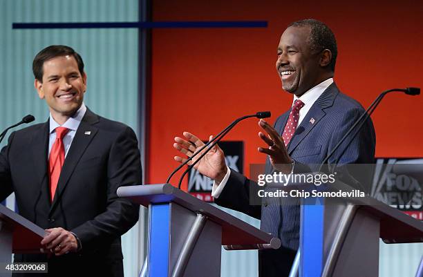 Republican presidential candidates Sen. Marco Rubio and Ben Carson participate in the first prime-time presidential debate hosted by FOX News and...