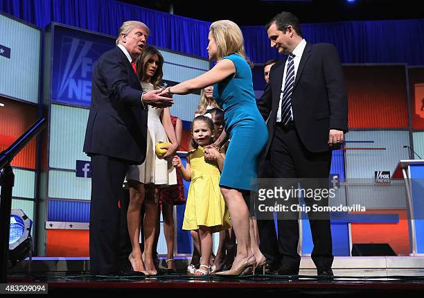 Republican presidential candidate Donald Trump and his wife Melania Trump greet Sen. Ted Cruz and his wife Heidi Nelson Cruz and their children on...