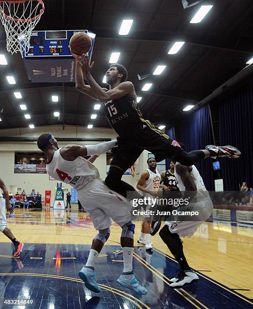 Scott Suggs of the Erie BayHawks goes to the basket against Derrick Byars of the Bakersfield Jam during a D-League game on April 5, 2014 at Dignity...