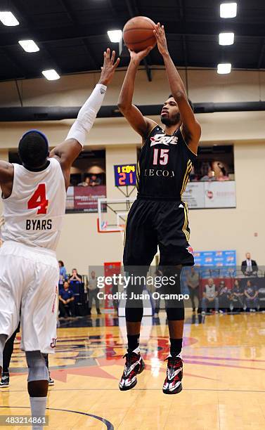 Scott Suggs of the Erie BayHawks shoots over Derrick Byars of the Bakersfield Jam during a D-League game on April 5, 2014 at Dignity Health Event...