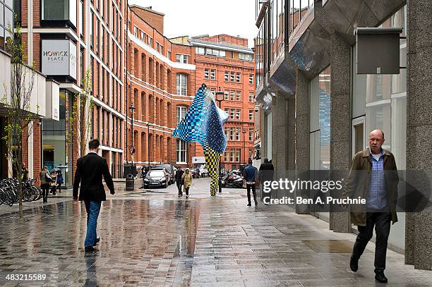 The new 'Wind Sculpture' of artist Yinka Shonibare MBE is seen on Howick Place on April 7, 2014 in London, England.