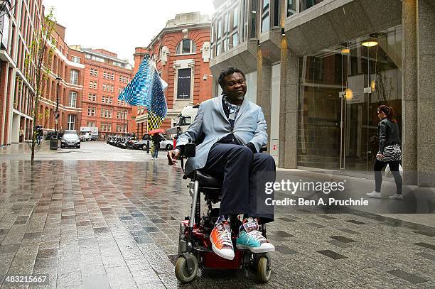 Artist Yinka Shonibare MBE poses as he unveils the new 'Wind Sculpture' on Howick Place on April 7, 2014 in London, England.