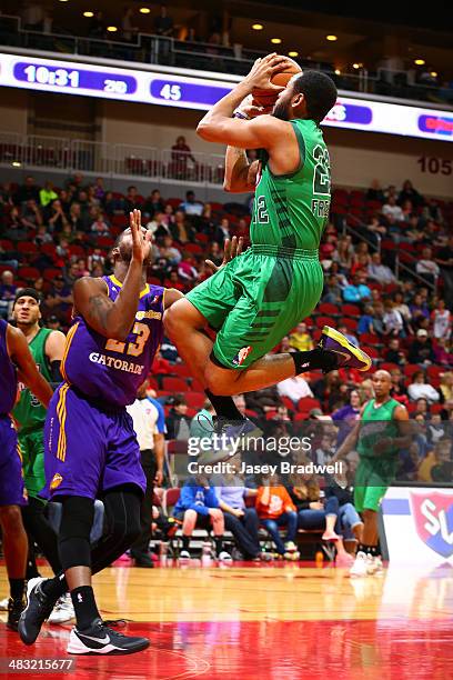 Austin Freeman of the Iowa Energy hovers in the paint past Travis Hyman of the Los Angeles D-Fenders in an NBA D-League game on April 5, 2014 at the...