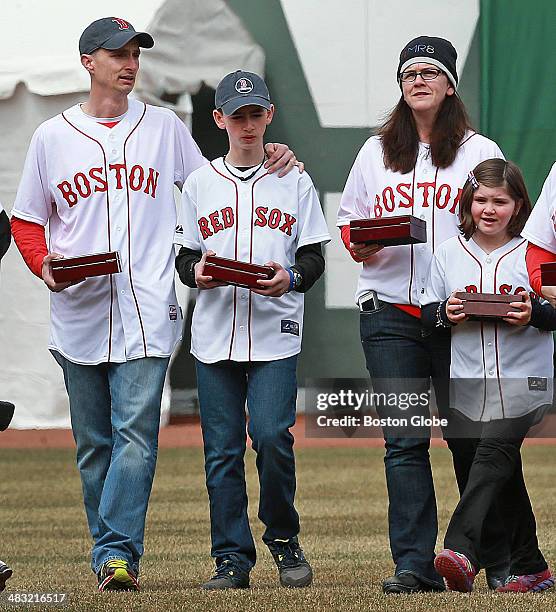 The Boston Red Sox 2013 World Series team received their championship rings during a pre-game ceremony before their home opener at Fenway Park...