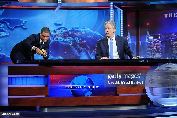 Trevor Noah and host Jon Stewart appear on "The Daily Show with Jon Stewart" #JonVoyage on August 6, 2015 in New York City.