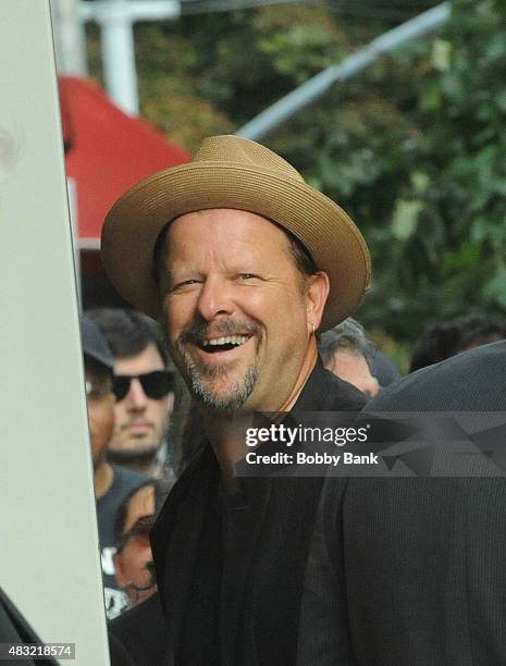 Photographer/filmmaker Danny Clinch enters the final "The Daily Show With Jon Stewart" taping at The Daily Show Building on August 6, 2015 in New...