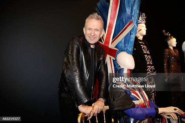 Jean Paul Gaultier poses with a metre high mohican in the Punk Cancan section of 'The Fashion World of Jean Paul Gaultier: From the Sidewalk to the...