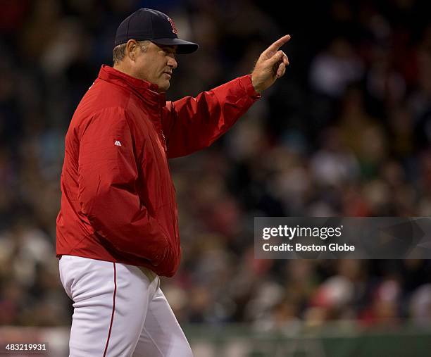 Boston Red Sox manager John Farrell goes for a left hander in the bull pen after starting pitcher Clay Buchholz gave up 13 hits to the Milwaukee...