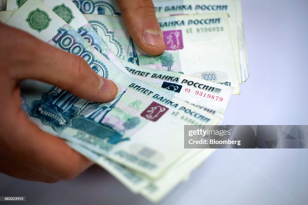 Ukrainian Hryvnia And Russian Ruble Currency Banknotes As Ukraine Tensions Rise