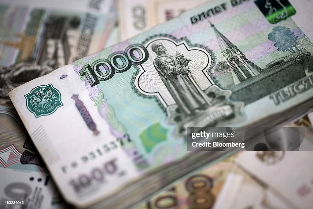 Ukrainian Hryvnia And Russian Ruble Currency Banknotes As Ukraine Tensions Rise