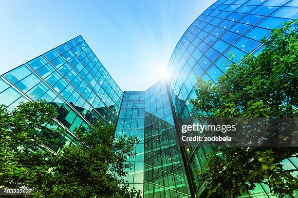 corporate modern offices building in london - building trees stock pictures, royalty-free photos & images