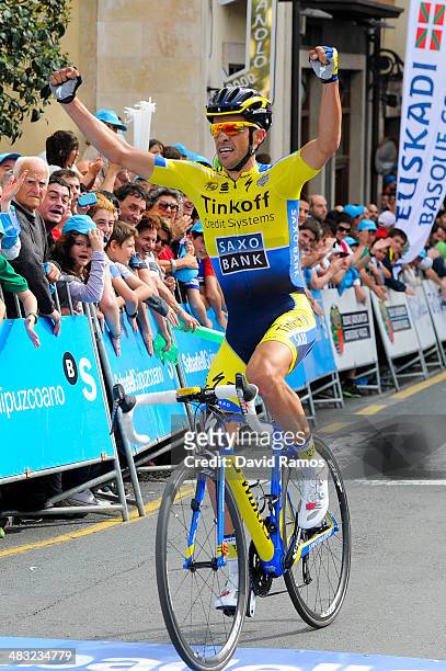 Alberto Contador of Spain and Team Tinkoff-Saxo smiles on the podiuem after winning the Stage One of Vuelta al pais Vasco 2014 on April 7, 2014 in...