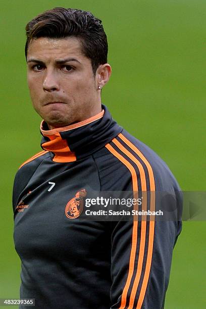 Cristiano Ronaldo of Madrid stops during a training session at Signal Iduna Park prior to the UEFA Champions League quarter-final match between...