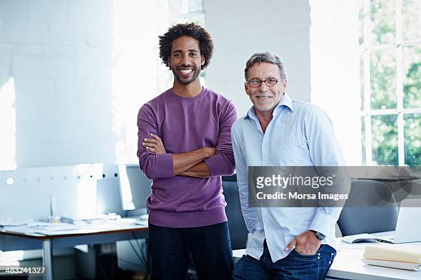 business colleagues in bright office - due persone foto e immagini stock