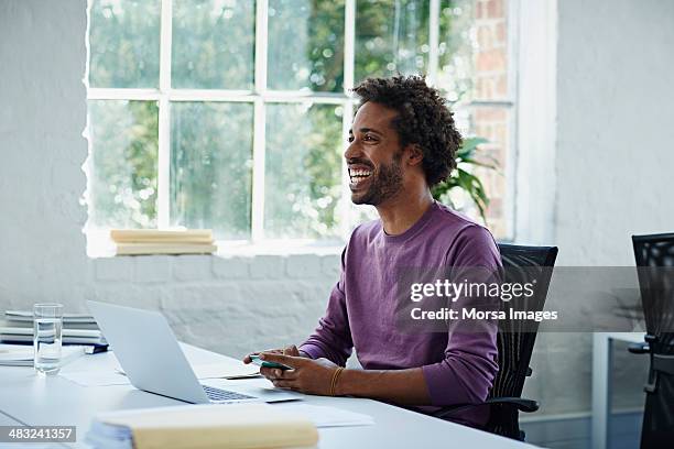 businessman texting on the phone - mr purple stock pictures, royalty-free photos & images