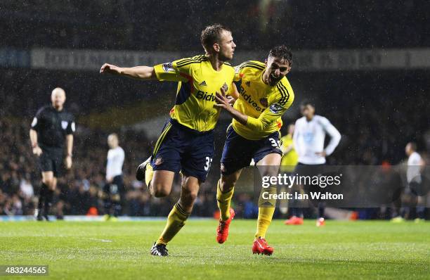 Lee Cattermole of Sunderland celebrates scoring the opening goal with Fabio Borini of Sunderland during the Barclays Premier League match between...