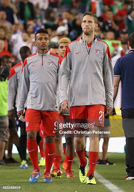 Julian Green and Clarence Goodson of USA lead teammates onto the field before the International Friendly against Mexico at University of Phoenix...