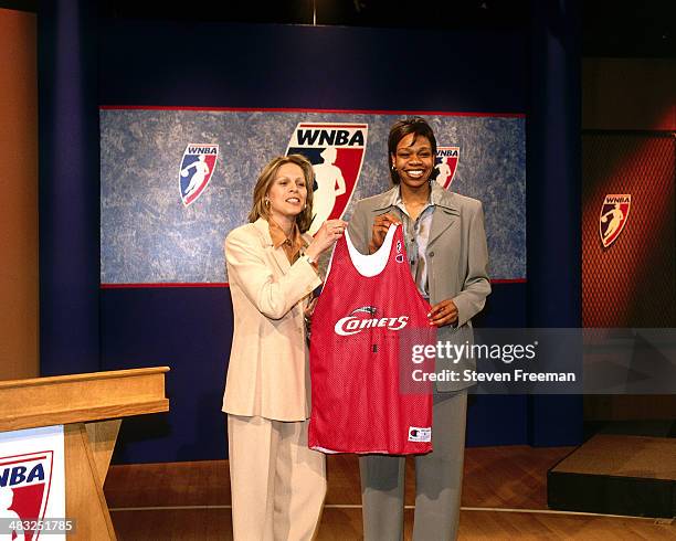 Tina Thompson, choosen number one overall by the Houston Comets poses with WNBA President Val Ackerman at the NBAE Studios on April 28, 1997 in...