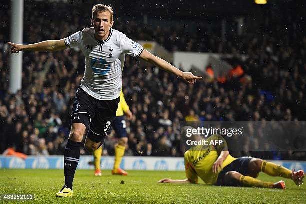 Tottenham Hotspur's English striker Harry Kane celebrates scoring Tottenham's second goal during the English Premier League football match between...